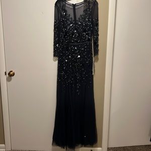 Gown navy blue from Saks Off 5th.size 10- fits like a medium. Brand new